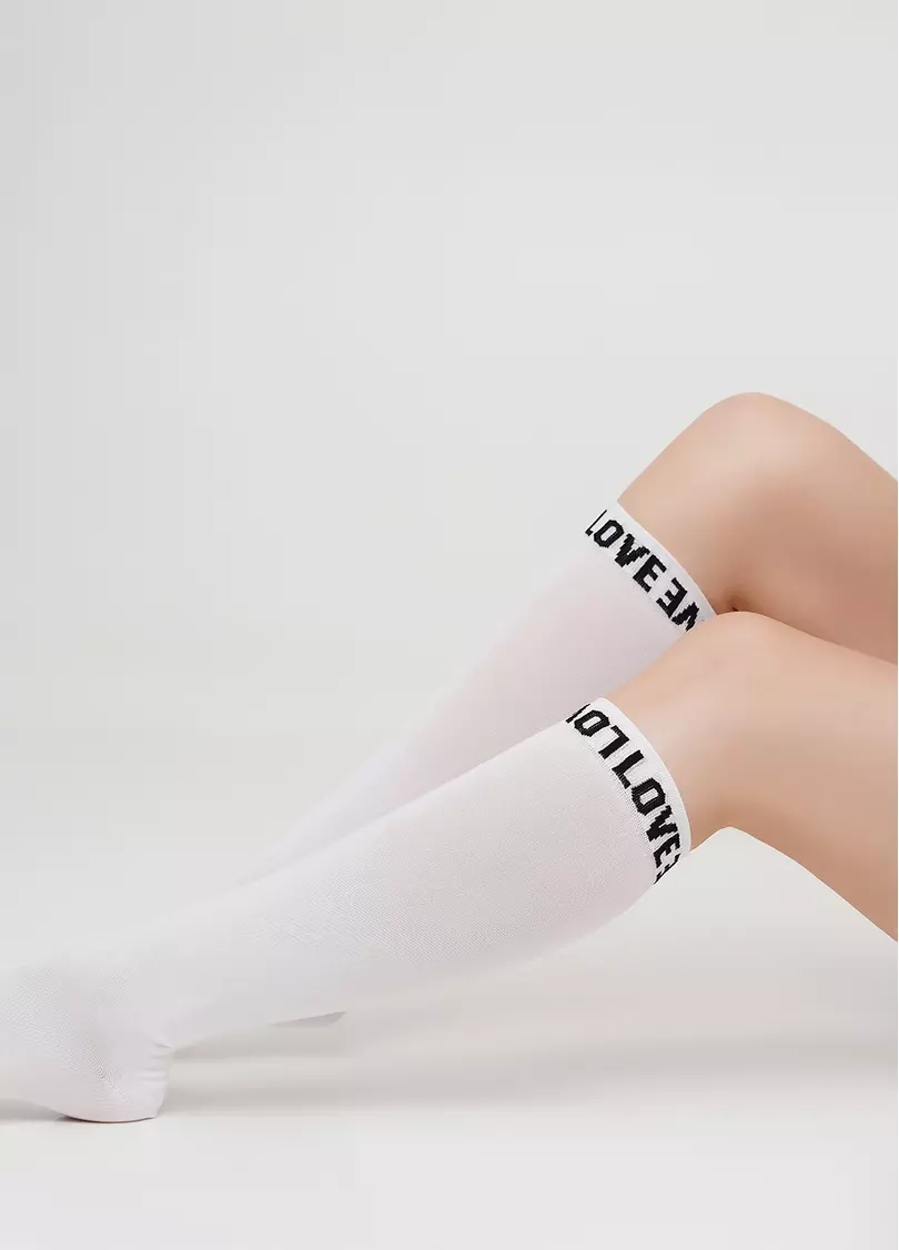 Бавовняні гольфи однотонні з текстовим візерунком на резинці WG1 TEXT 002 (білий)