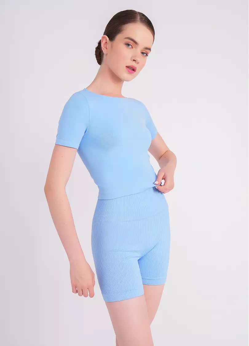 Укорочена безшовна футболка CROP T-SHIRT lacecap hydrangea (блакитний)