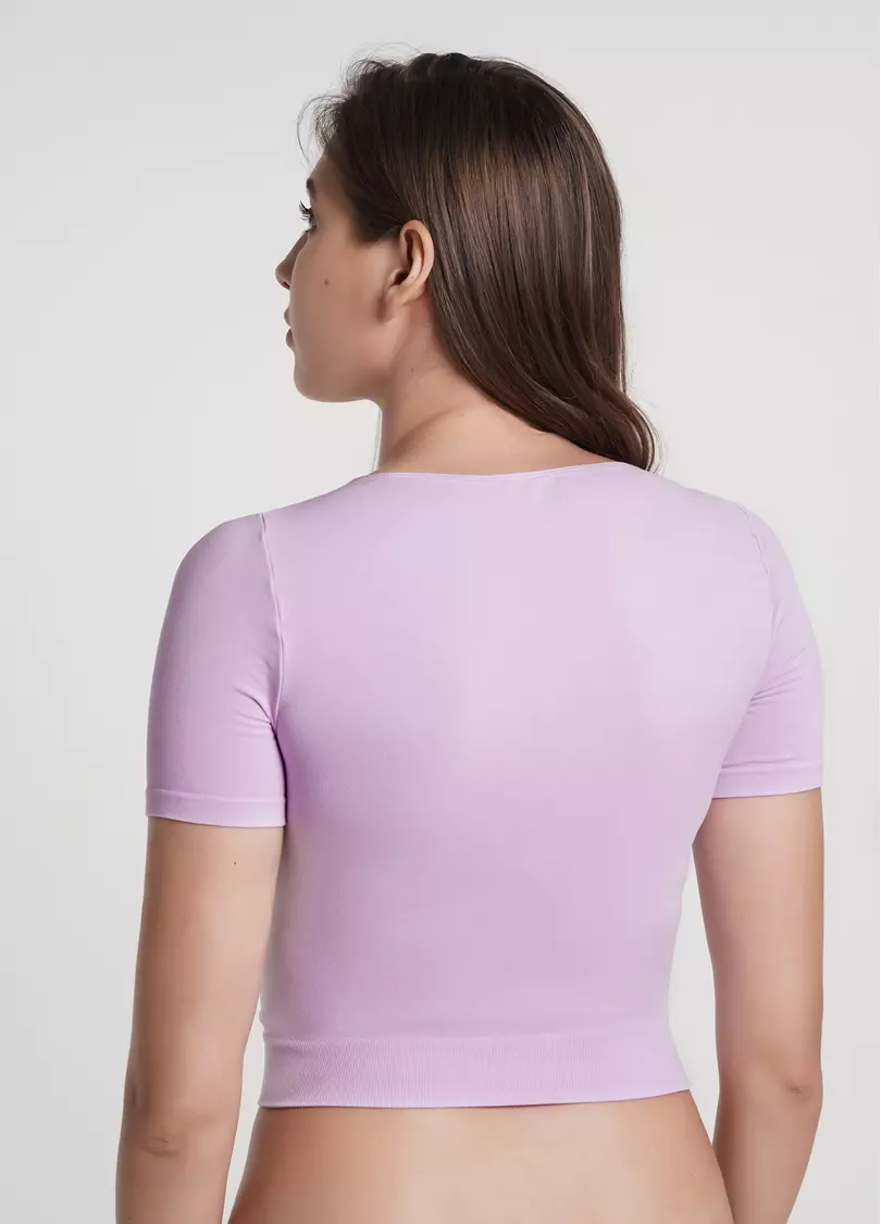 Укорочена безшовна футболка CROP T-SHIRT orchid bloom (фіолетовий)